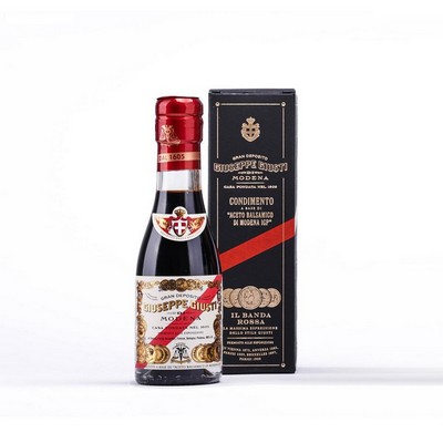 „Balsamico-Essig aus Modena g.g.A. – 5 Goldmedaillen“ „Rotes Band““ Champagnerflasche im 100er-Kart